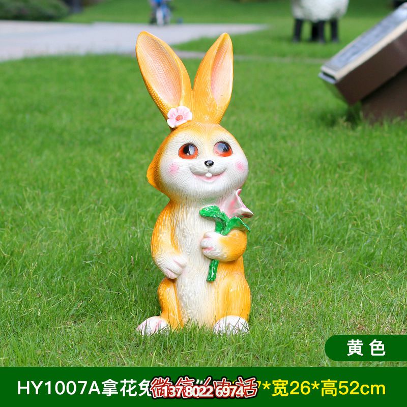 黃色樹脂兔子雕塑，室內(nèi)擺放只有一個