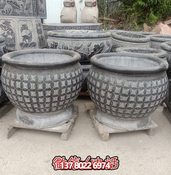 自然美學(xué)結(jié)合青石石雕、浮雕、編織、雕塑的戶外園林魚缸